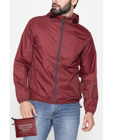 GIUBBINO ANTIVENTO TASCABILE CON ZIP E CAPPUCCIO