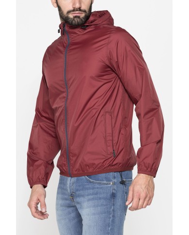 GIUBBINO ANTIVENTO TASCABILE CON ZIP E CAPPUCCIO