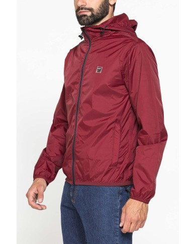 GIUBBINO ANTIVENTO TASCABILE CON ZIP E CAPPUCCIO