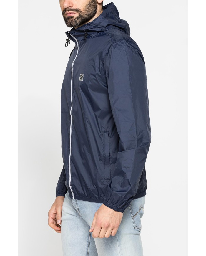 GIUBBINO ANTIVENTO TASCABILE CON ZIP E CAPPUCCIO