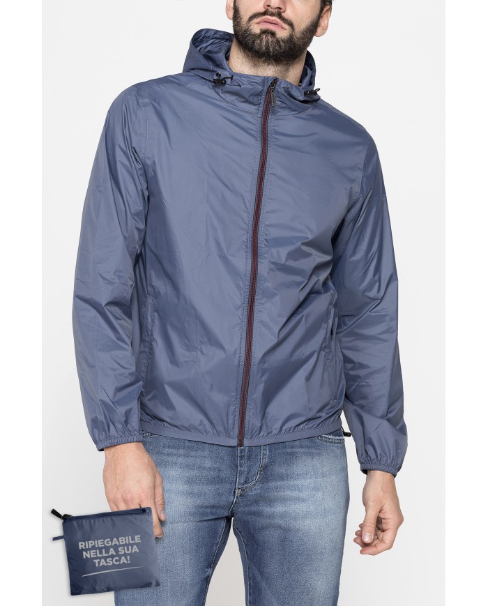 GIUBBINO ANTIVENTO TASCABILE CON ZIP E CAPPUCCIO