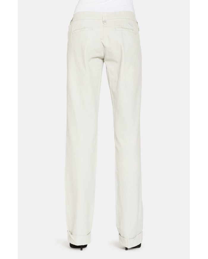 PANTALONI IN TESSUTO FERMO DI COTONE. Vita bassa e gamba regolare.